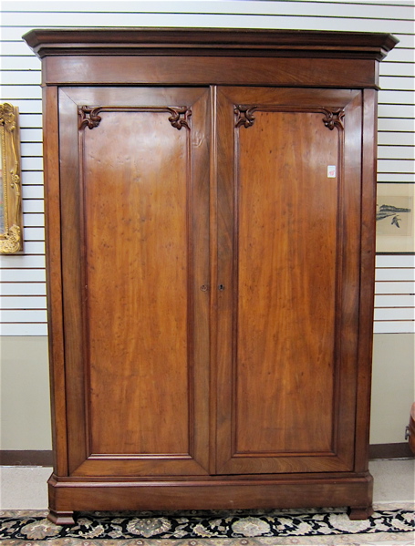 Appraisal: VICTORIAN TWO-DOOR MAHOGANY WARDROBE Continental th century featuring a full-length