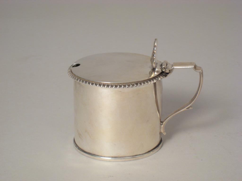 Appraisal: A George III drum Mustard Pot with hinged cover having