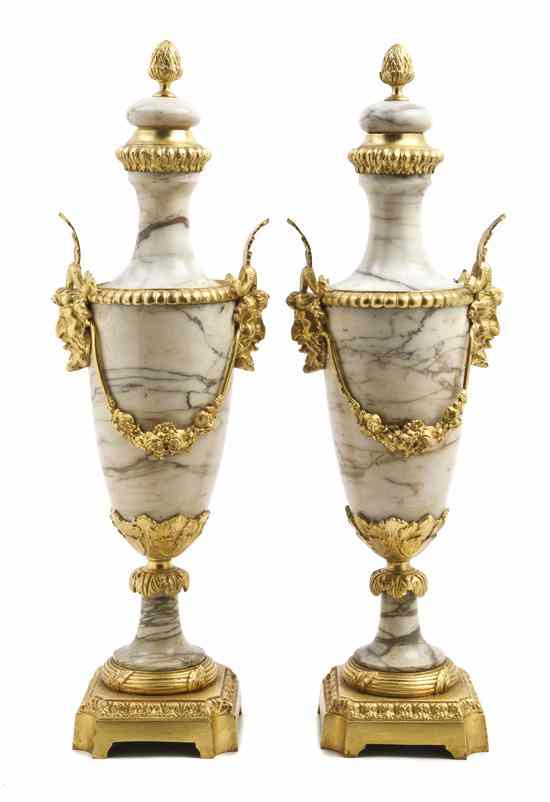 Appraisal: A Pair of Neoclassical Marble and Gilt Bronze Mounted Urns