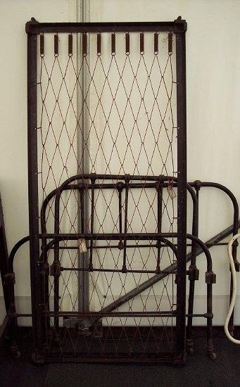 Appraisal: A child's pair of iron bed ends and another pair