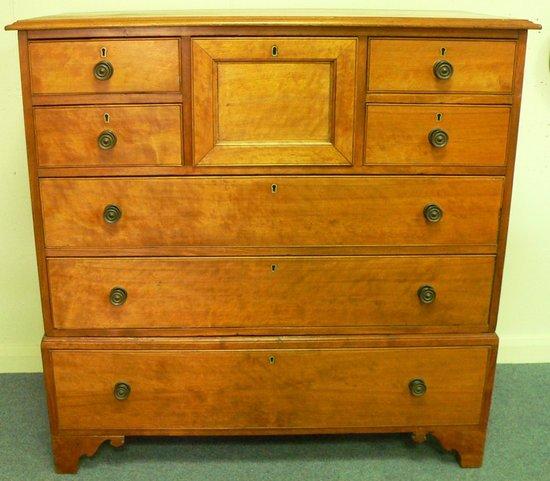 Appraisal: A Victorian satin walnut chest of five short and three