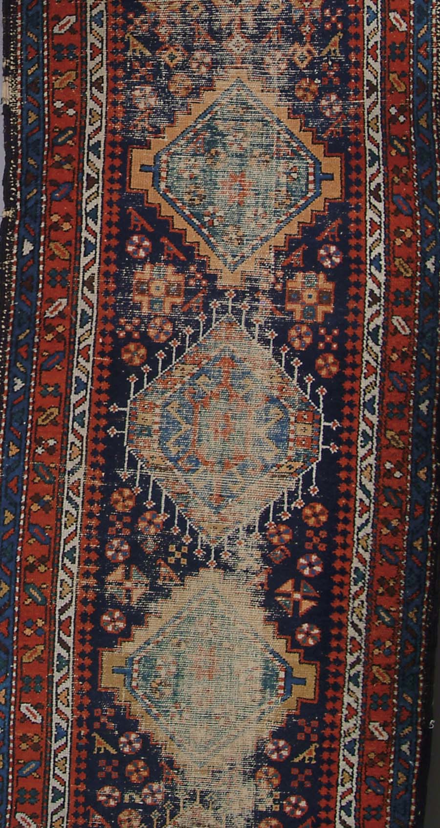 Appraisal: ORIENTAL RUNNER Blue field with seven diamond medallions multiple borders