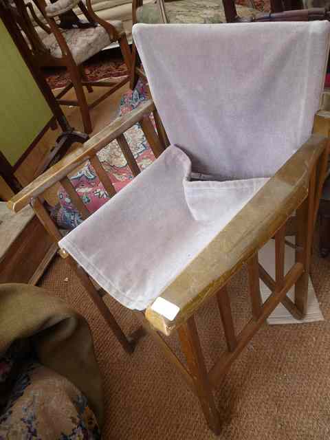 Appraisal: A SQUARE CARD TABLE together with four matching folding chairs