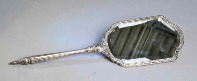 Appraisal: STERLING SILVER BEVELED GLASS HAND MIRRORBeautiful engraved Art Nouveau sterling