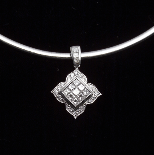 Appraisal: k white gold princess cut diamond pendant on a k