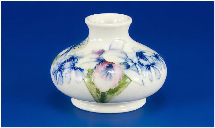 Appraisal: Moorcroft Squat Vase orchid pattern on white ground marks to