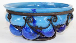 Appraisal: Daum Majorelle cobalt glass bowl with iron frame French Daum