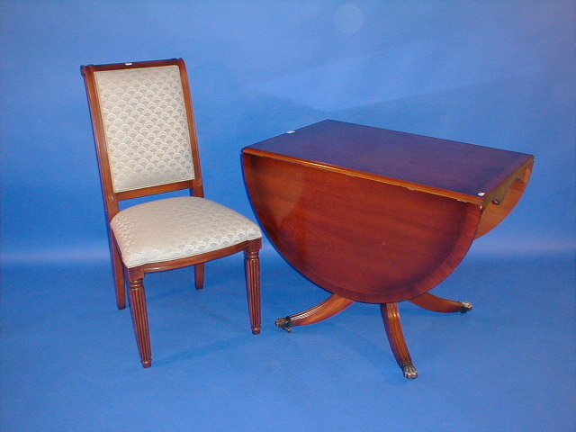 Appraisal: A reproduction mahogany drop leaf table and an upholstered side