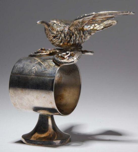 Appraisal: Humming Bird Figural Napkin Ring Description Large humming bird on