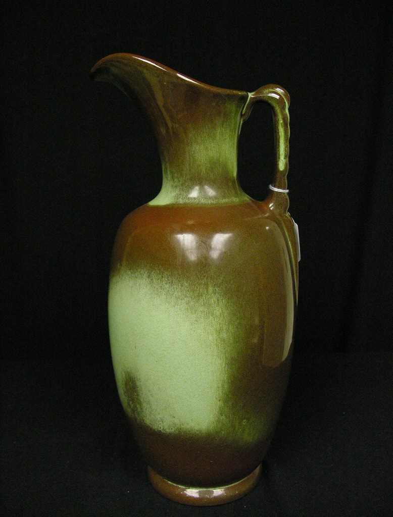 Appraisal: LARGE FRANKOMA EWER Size with diameter Condition glaze pop outside