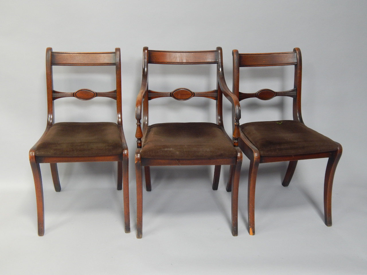 Appraisal: Three Georgian bar back chairs comprising of a carver and