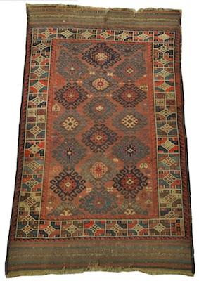 Appraisal: A Small Nomadic Carpet Approx '- x '- Low wool