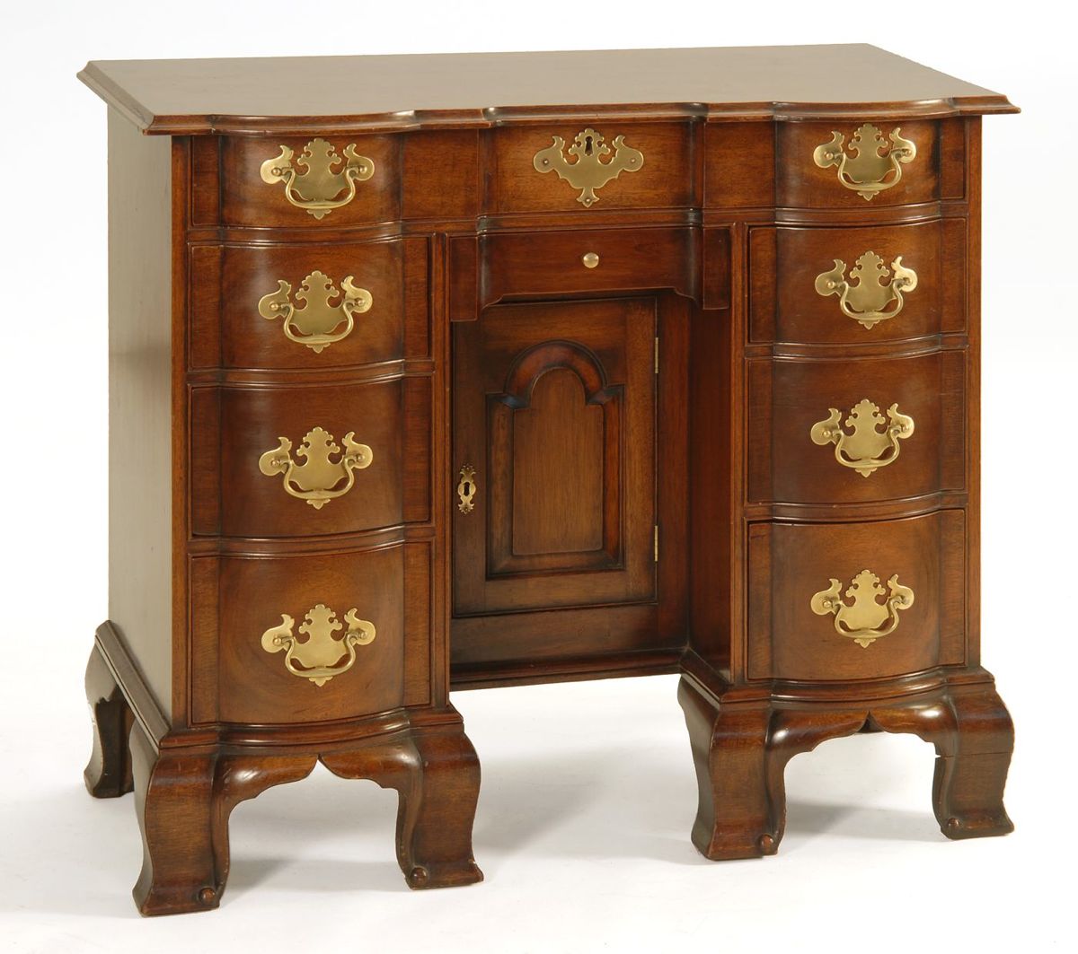 Appraisal: CHIPPENDALE-STYLE BENCH-MADE BLOCK-FRONT KNEEHOLE DESK In mahogany with molded top