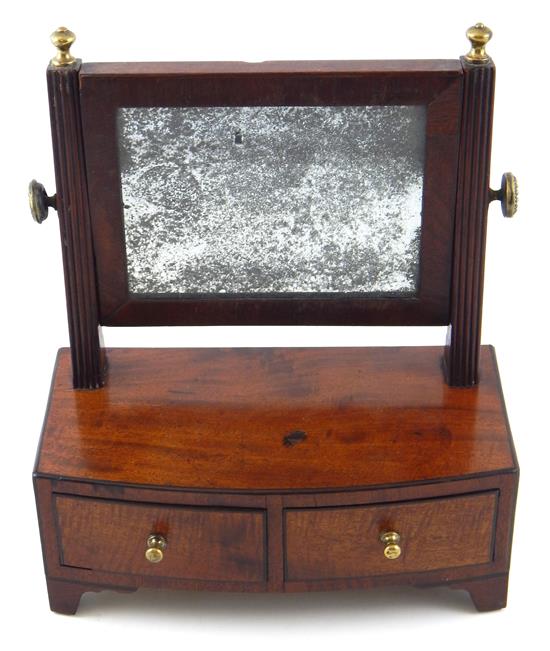 Appraisal: th C American diminutive shaving mirror on stand mahogany mahogany