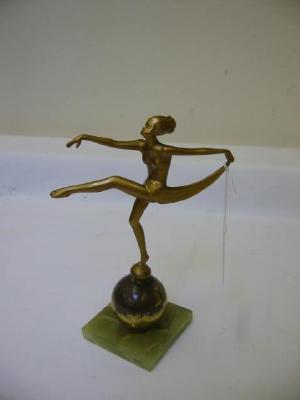 Appraisal: A GILDED SPELTER ART DECO FIGURE of a scantily draped