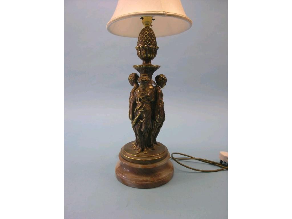 Appraisal: A simulated gilt-bronze table lamp stem in the form of