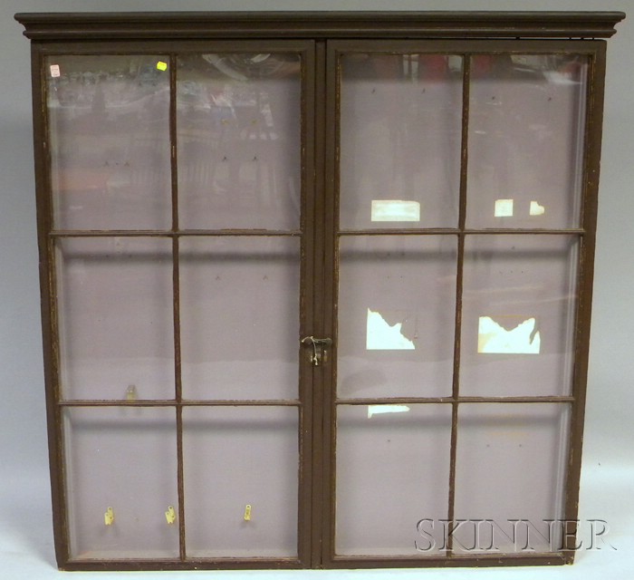 Appraisal: Glazed Brown-painted Wooden Two-Door Cabinet early th century the interior