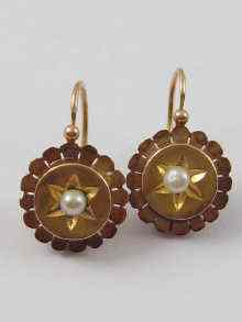 Appraisal: A pair of French hallmarked ct gold pearl set earrings