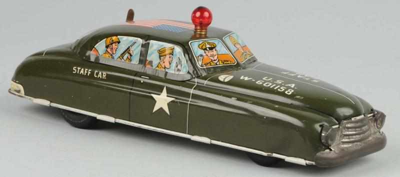 Appraisal: Tin Marx Army Staff Car Wind-Up Toy Description American Working