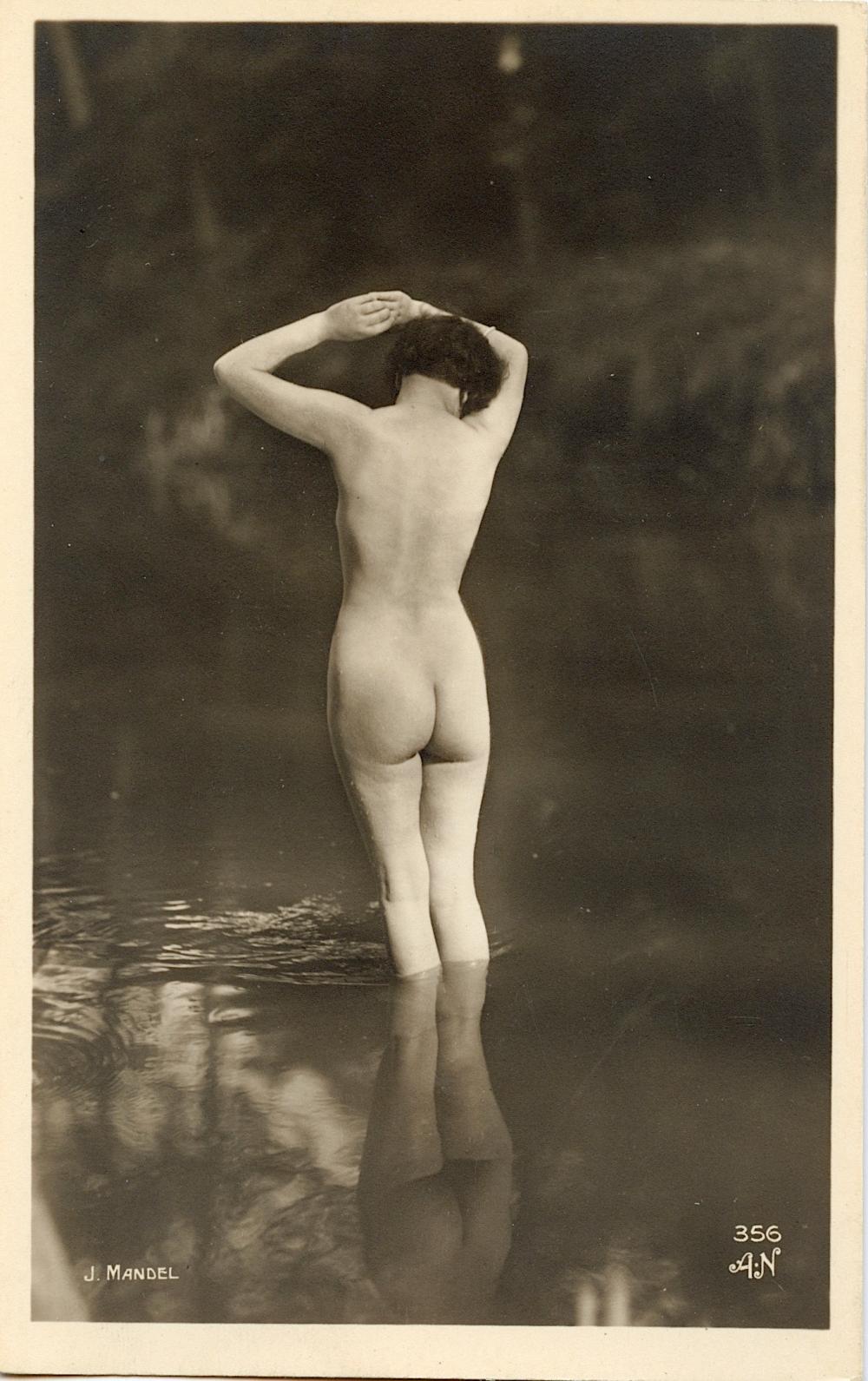 Appraisal: ANTIQUE REAL PHOTO POSTCARD ARTISTIC NUDE MANDELThe dimensions of an