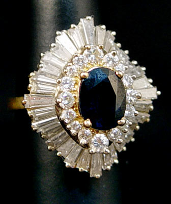 Appraisal: SAPPHIRE DIAMOND BALLERINA TYPE RING K yellow gold ring set