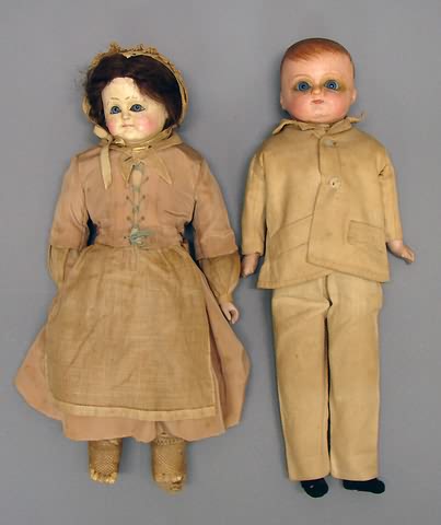 Appraisal: Pair of patent washable type papier mache dolls Boy with