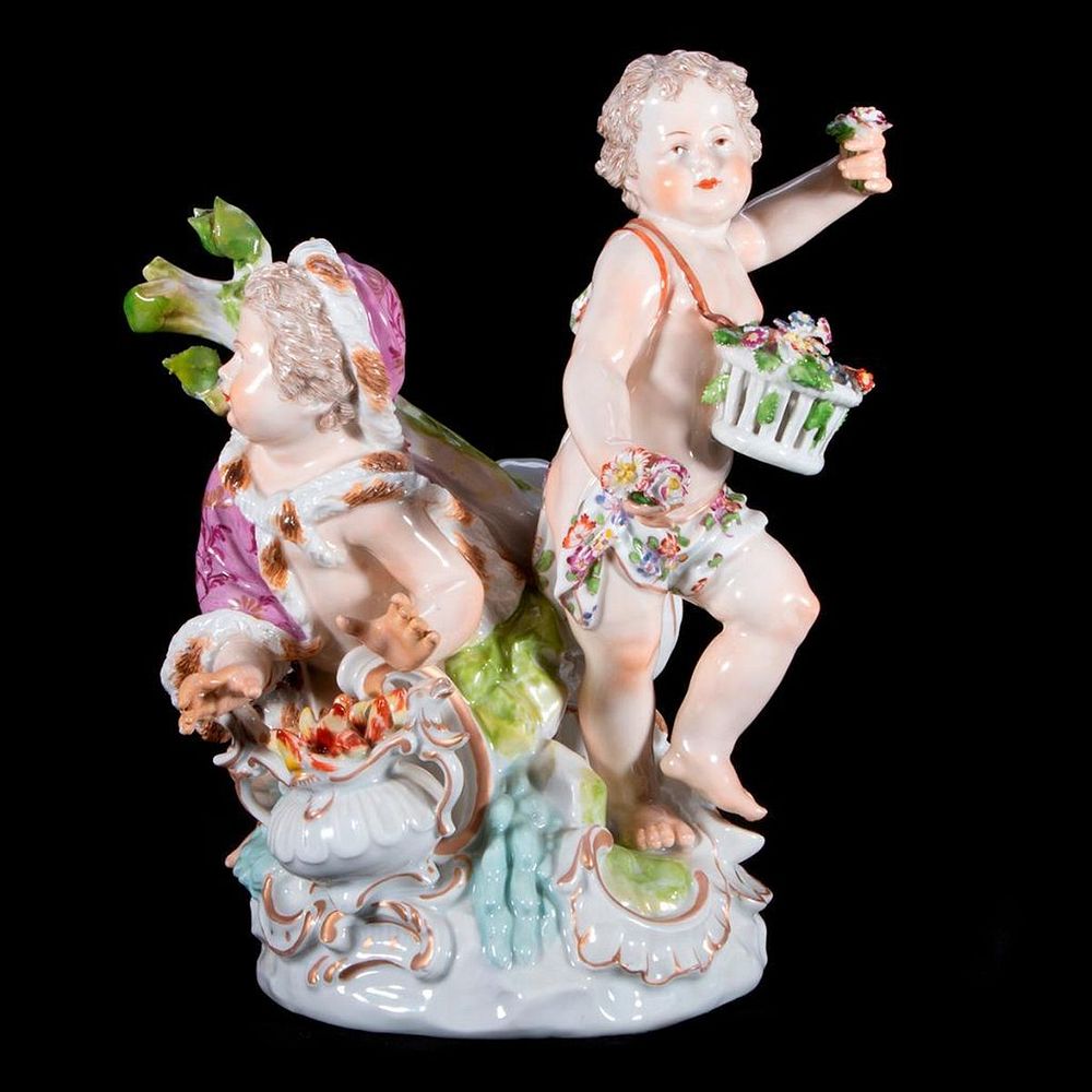 Appraisal: A continental porcelain frolicking children A continental porcelain pair of