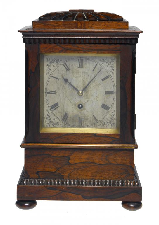 Appraisal: A WILLIAM IV ROSEWOOD TIMEPIECE the silvered square dial with