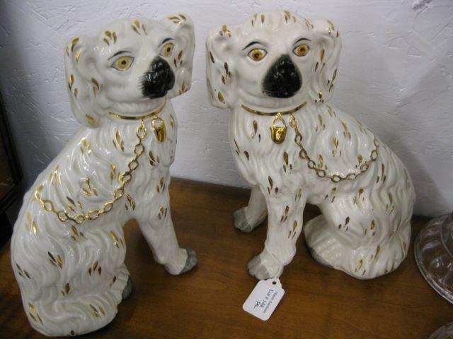 Appraisal: Pair of Staffordshire Spaniel Figurines tall excellent