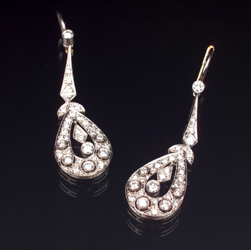 Appraisal: DIAMOND Pendeloque earrings in platinum Each composed of a tear-drop