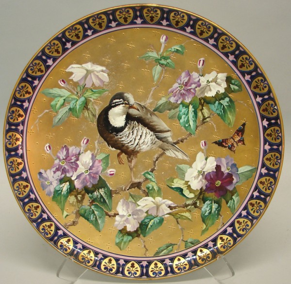 Appraisal: Charger features central bird on branch surrounded by purple flowers