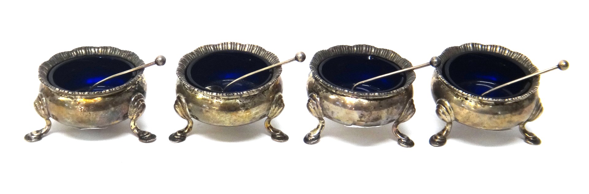 Appraisal: A set of four silver circular salts each of caldron