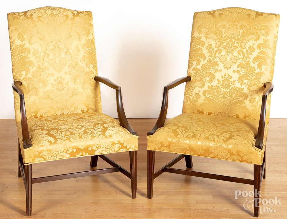 Appraisal: Pair of Federal style mahogany lolling chairs Pair of Federal