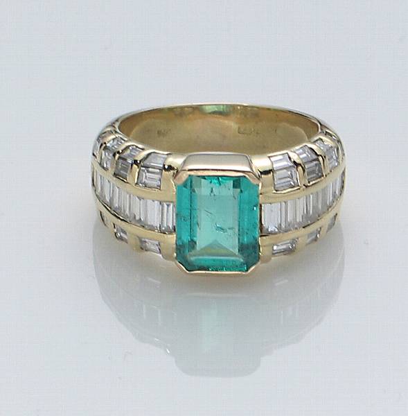 Appraisal: An emerald diamond and k gold ring estimated emerald weight