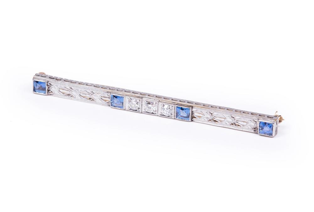 Appraisal: KT WHITE GOLD SAPPHIRE AND DIAMOND BAR PIN kt White