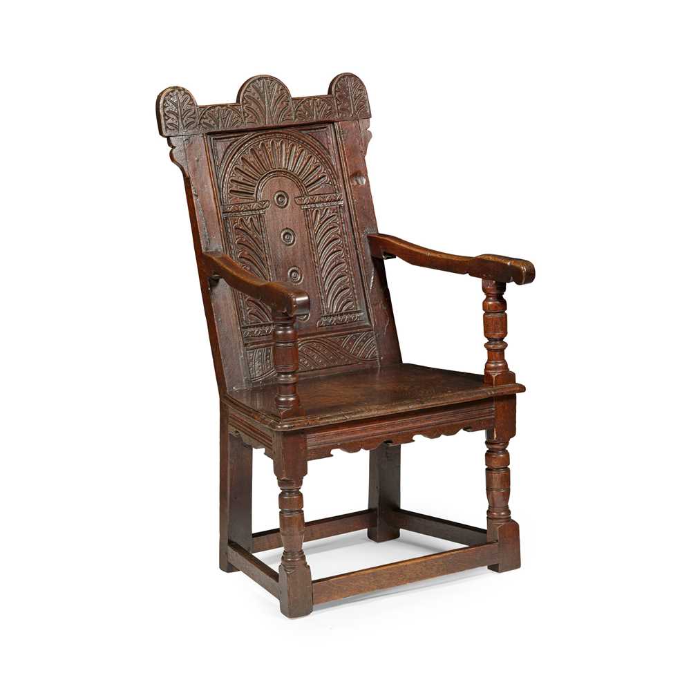 Appraisal: OAK WAINSCOT ARMCHAIR TH CENTURY the panel back carved with