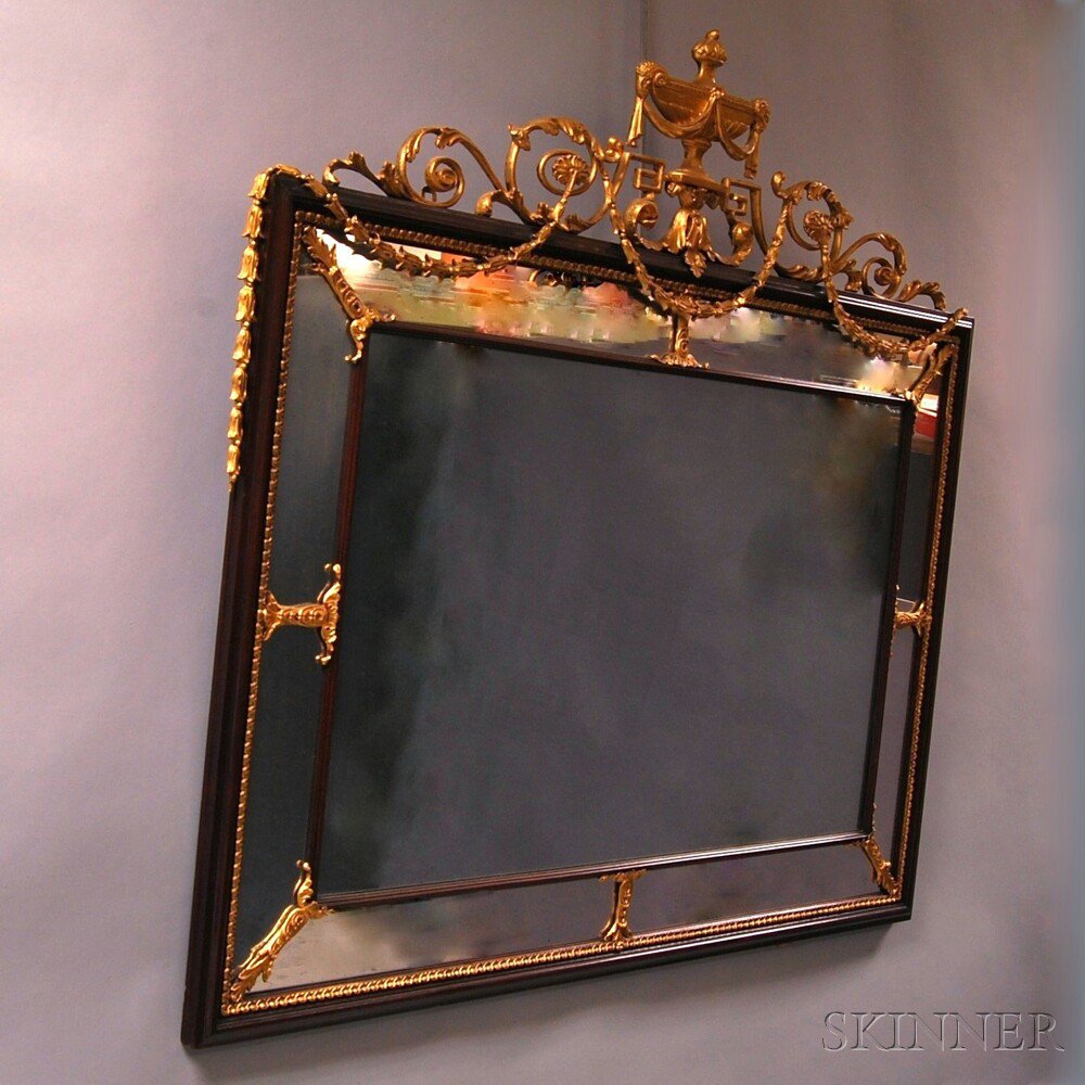 Appraisal: Neoclassical-style Parcel-gilt Mirror the gilt and foliate carved cresting with