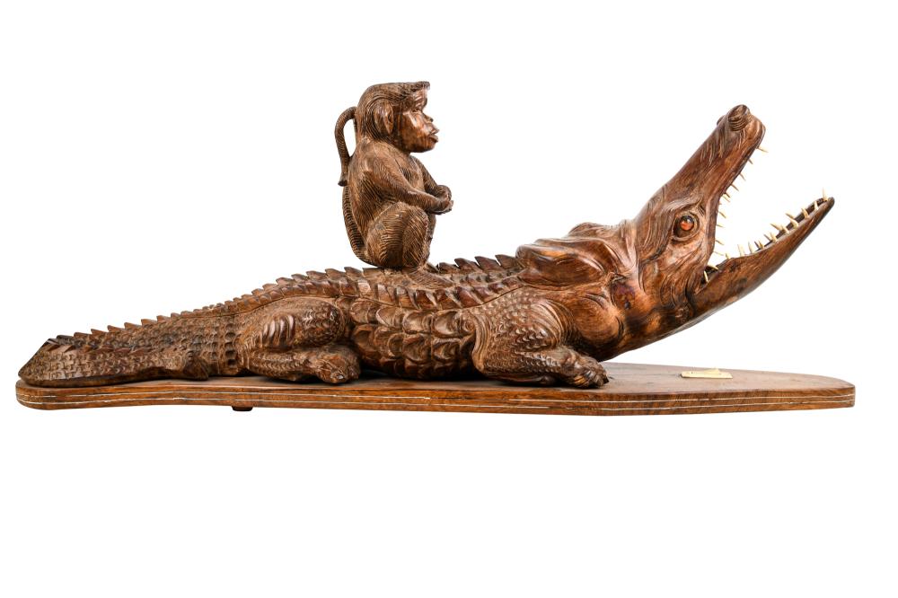 Appraisal: CARVED WOOD ALLIGATOR MONKEY TABLE LAMPthe socket fitted in the