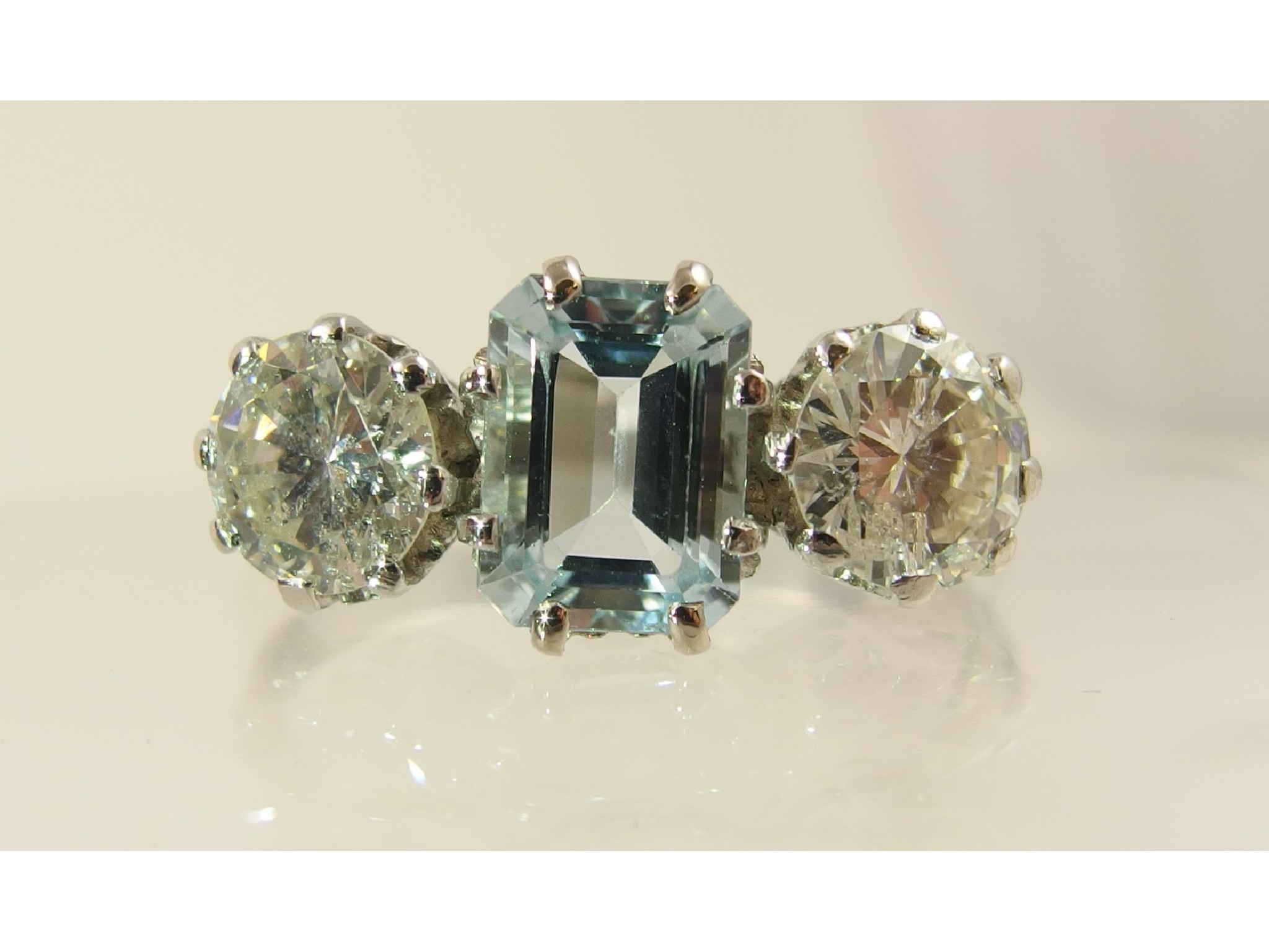 Appraisal: An aquamarine and diamond ringset throughout in unhallmarked white metal