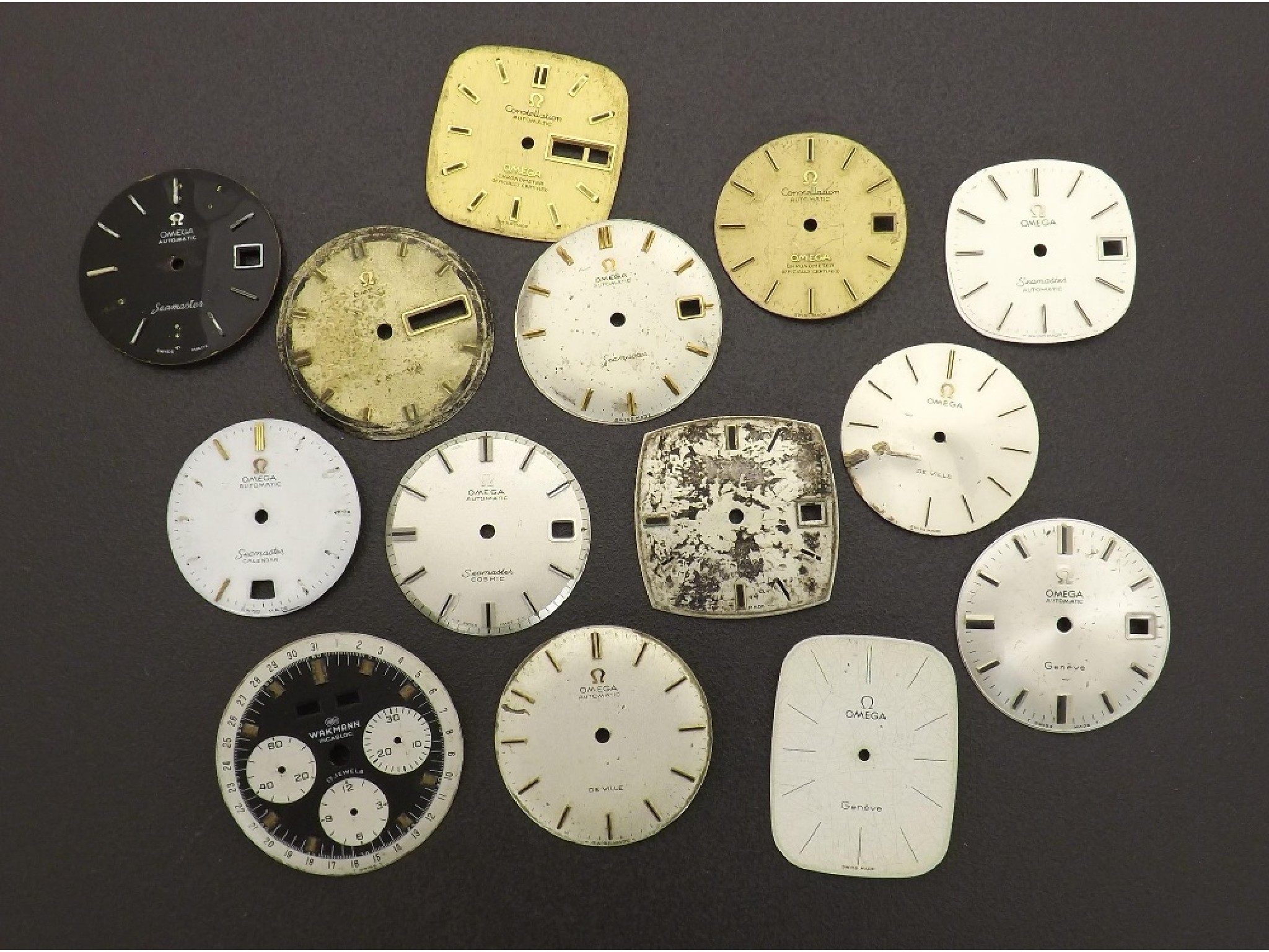 Appraisal: Selection of thirteen Omega vintage wristwatch dials together with a