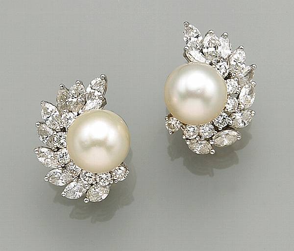 Appraisal: A pair of South Sea cultured pearl diamond and fourteen