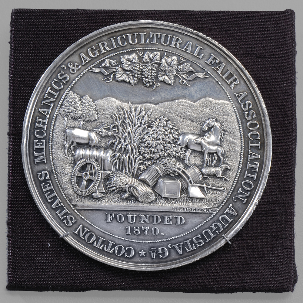 Appraisal: Georgia Agricultural Fair Coin Silver Medal harvesting scene marked E