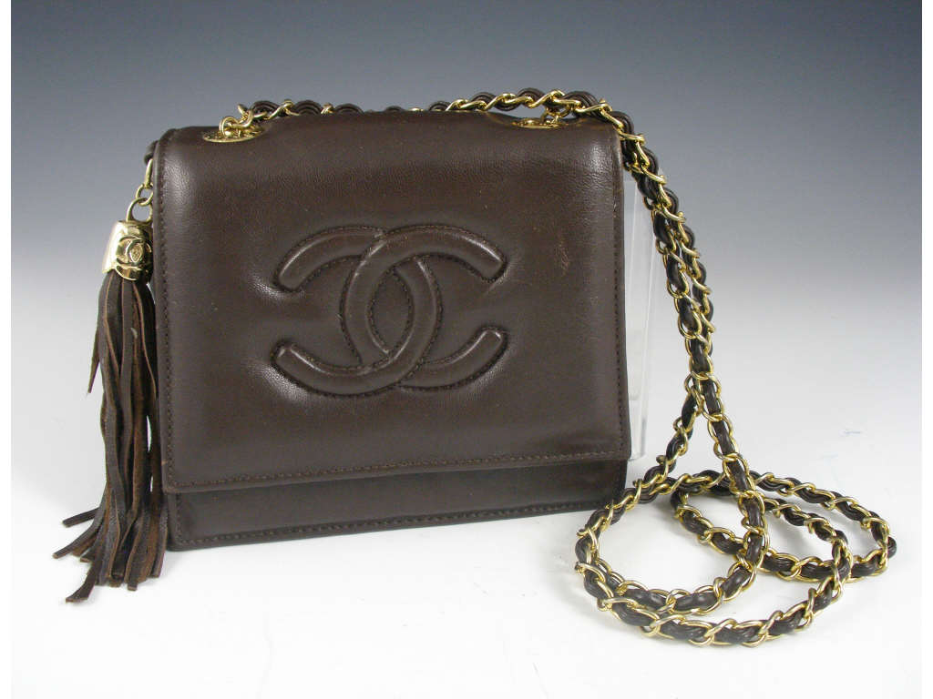 Appraisal: Coco Chanel Envelope Tassel Purse brown leather vintage Coco Chanel