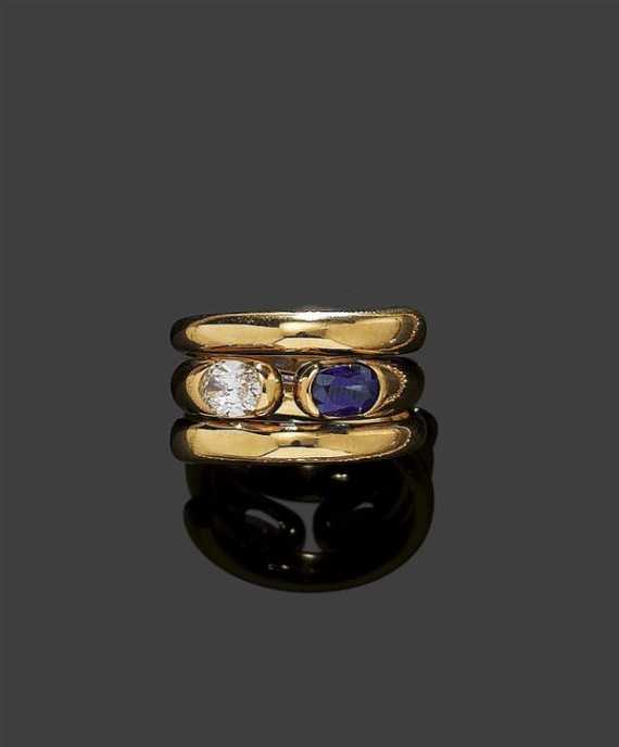 Appraisal: SAPPHIRE AND DIAMOND RING BULGARI Yellow gold Astrea Cobra model