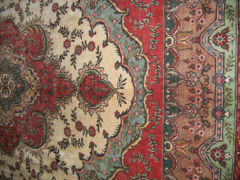 Appraisal: TABRIZ RO OM RUG The ivory field of floral design