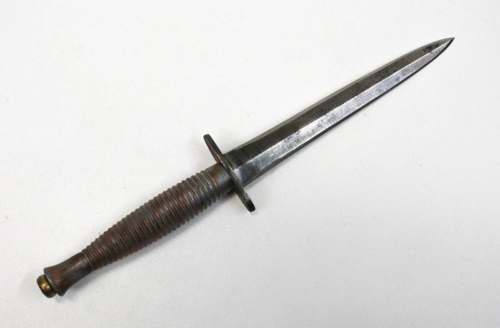 Appraisal: BRITISH FAIRBAIRN SYKES FIGHTING KNIFE having a double edge blade