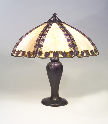 Appraisal: HANDEL Table lamp with an eight-paneled shade of caramel slag