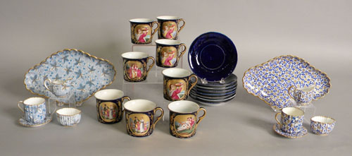 Appraisal: Eight demitasse cups and saucers with cobalt background and painted