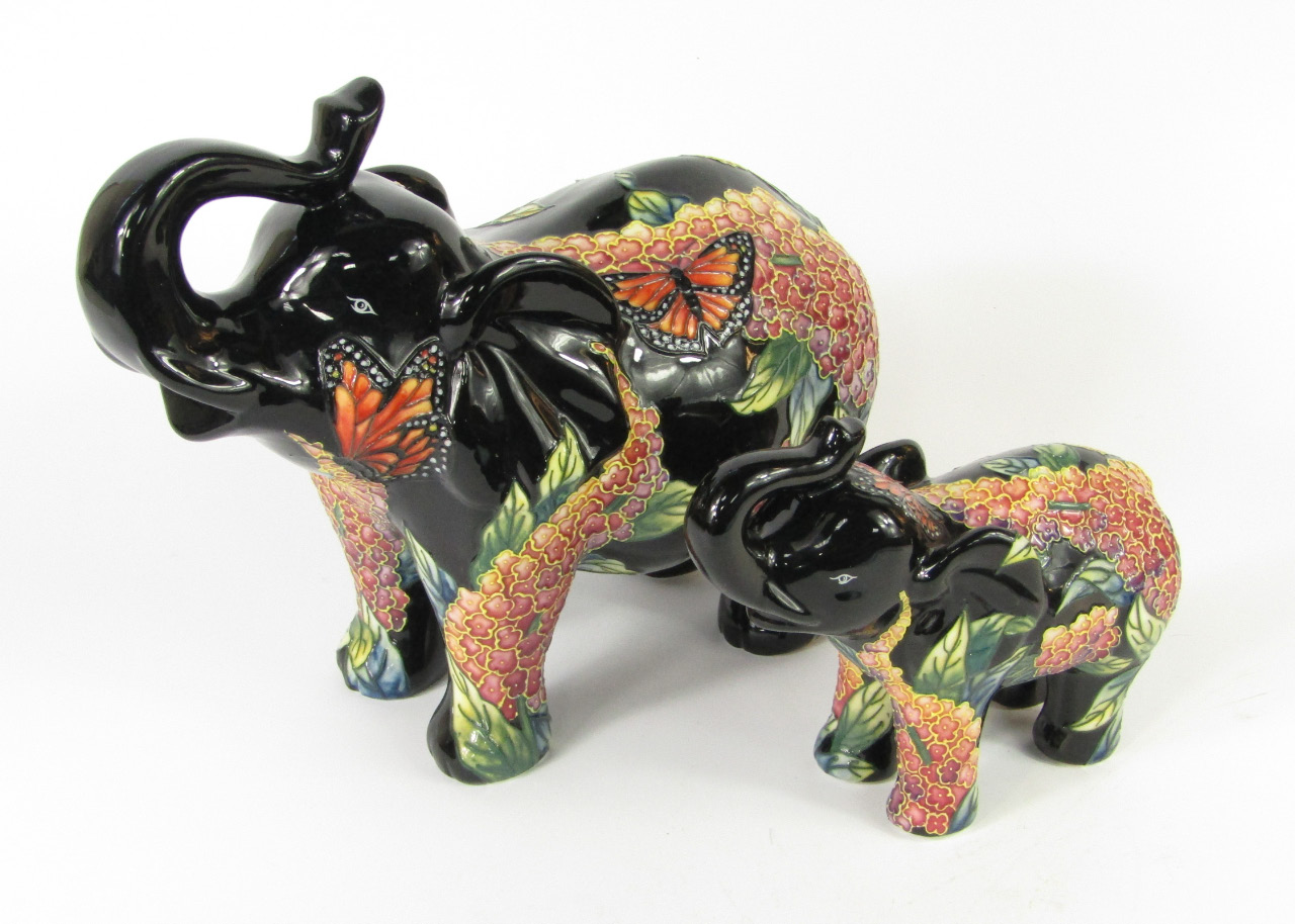 Appraisal: A pair of Country Artists Inspiration graduated pottery elephants over