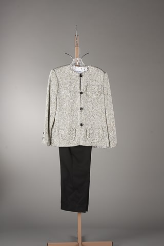 Appraisal: Andr Laug black white tweed wool jacket with rounded pockets